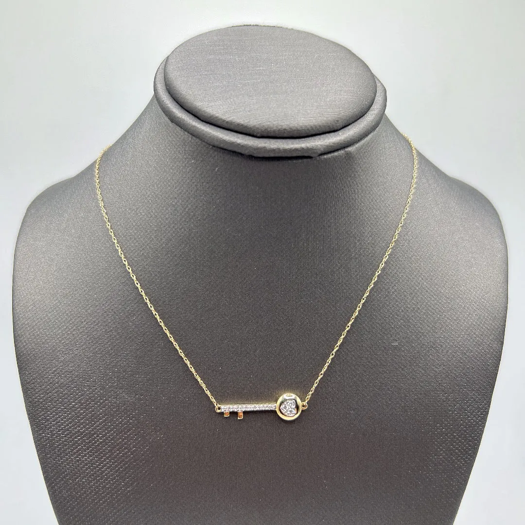 10KT DIAMOND KEY PENDANT