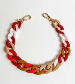 Ruby red phone and purse strap