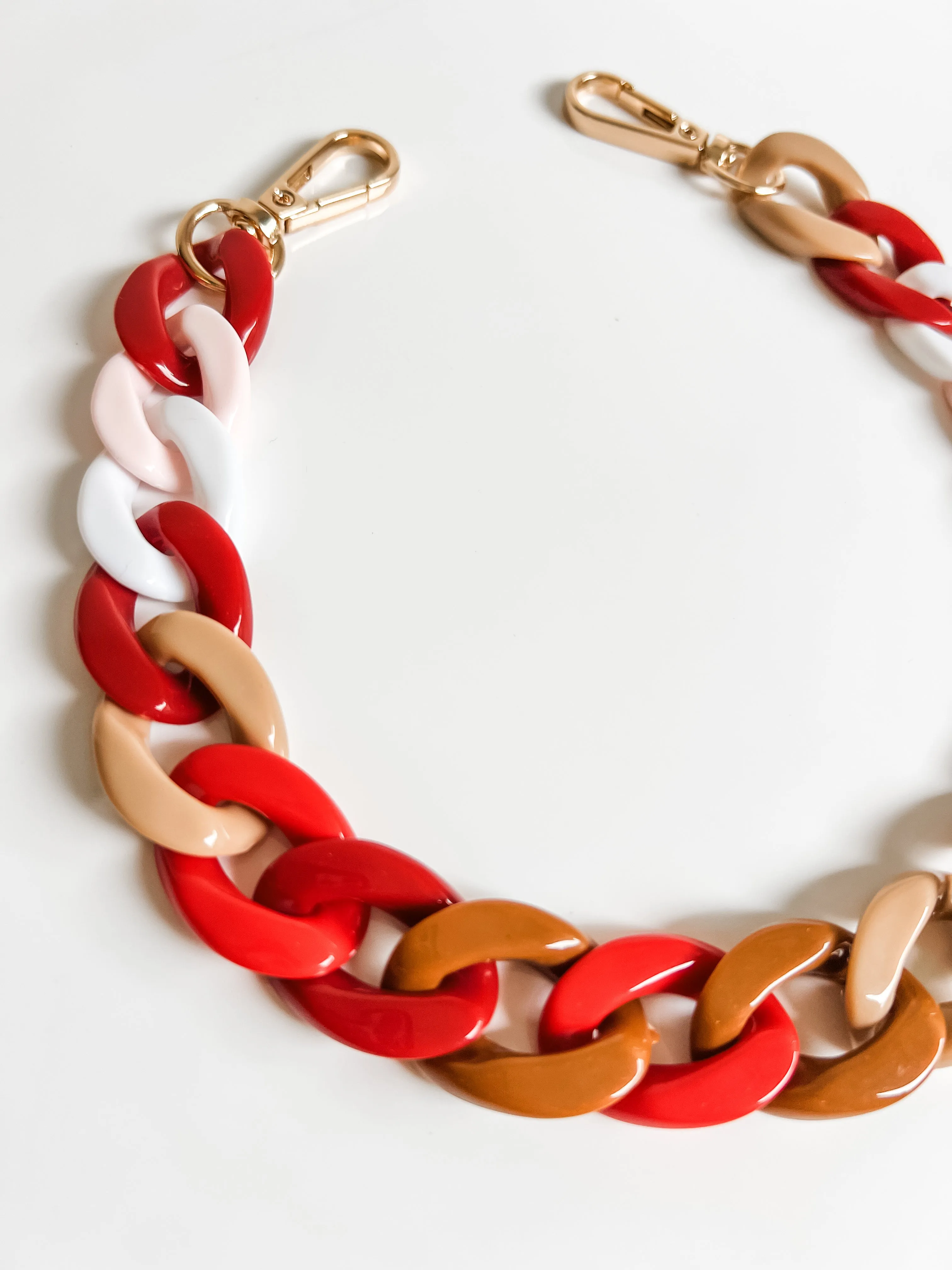 Ruby red phone and purse strap
