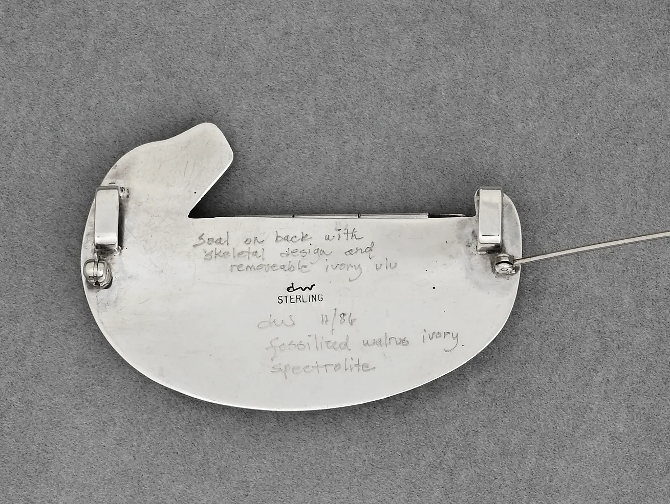 Seal with Skeletal Design Pin/Pendant by Denise and Samuel Wallace